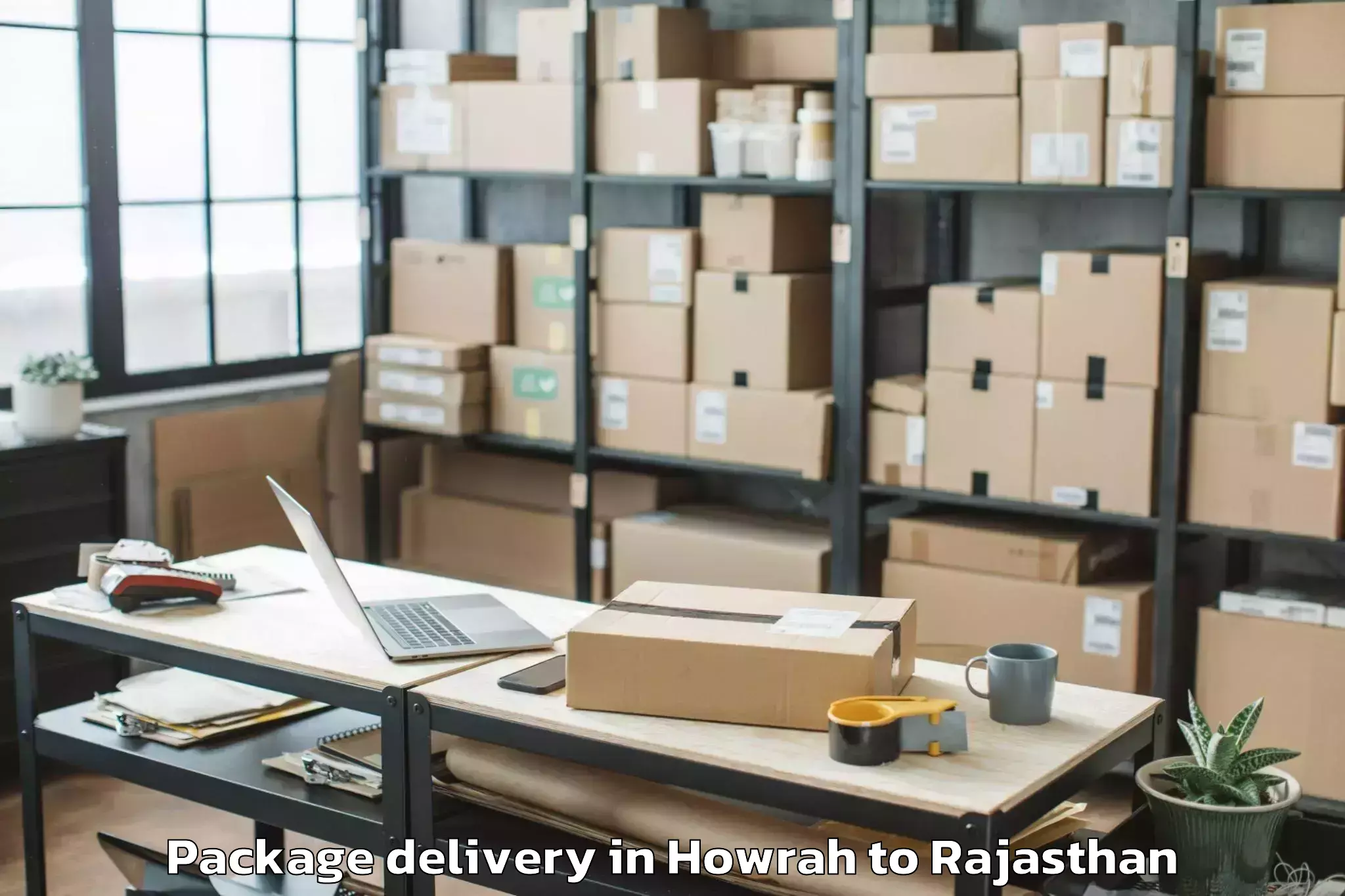 Professional Howrah to Niwai Package Delivery